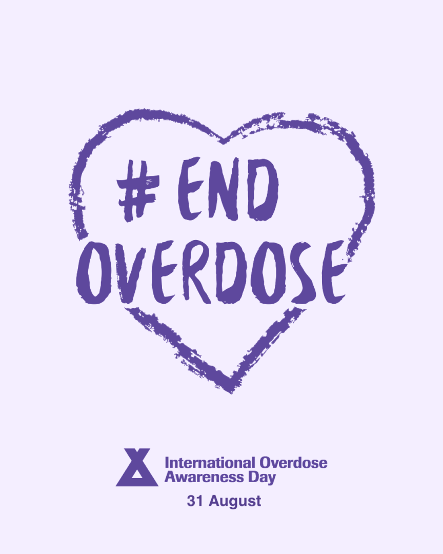 End Overdose-International Overdose Awareness Day August with a dark purple heart on a light purple background